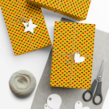 Load image into Gallery viewer, Colors of Africa Hearts Gift Wrapping Paper Roll (Main Color Yellow) Yellow gift boxes with heart patterns, string, scissors, and yarn on a white background