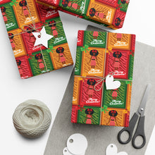 Load image into Gallery viewer, Festive African American Doll - Christmas Gift Wrap Paper (Afro Hairstyle) Colorful Christmas gift boxes with decorative patterns on a white surface.