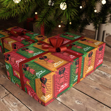 Load image into Gallery viewer, Festive African American Doll - Christmas Gift Wrap Paper (Afro Hairstyle)  under a Christmas tree.