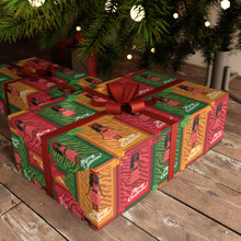 Load image into Gallery viewer, Festive African American Doll - Christmas Gift Wrap Paper (Long Dreadlocks Hairstyle w/Beads) under a decorated Christmas tree.
