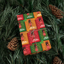 Load image into Gallery viewer, Festive African American Doll - Christmas Gift Wrap Paper (Long Dreadlocks Hairstyle w/Beads)wrapping paper on a green leafy background