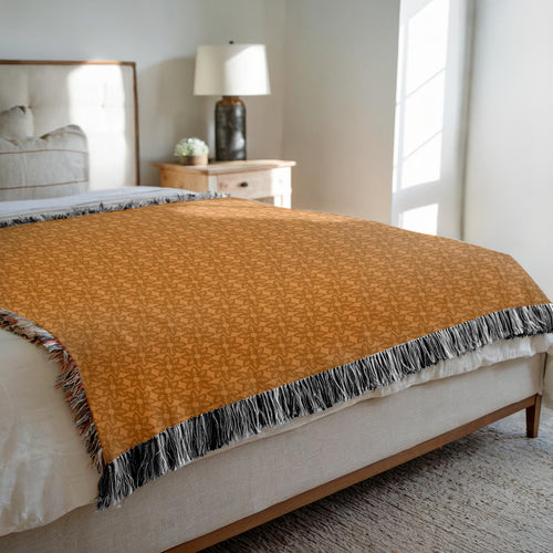 Think Positive - Orange Cozy Decorative Woven Blankets - 3 Sizes - Home Décor & Gift Giving on Sample Bed